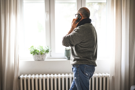 man calling for hvac service provider